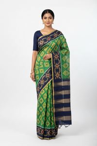 Tamalika – Green Handloom Ikat Cotton Saree with Navy Blue Border