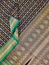 Vaidehi – Black Aayiram Butta Handloom Kanchi Cotton Saree with Green Border
