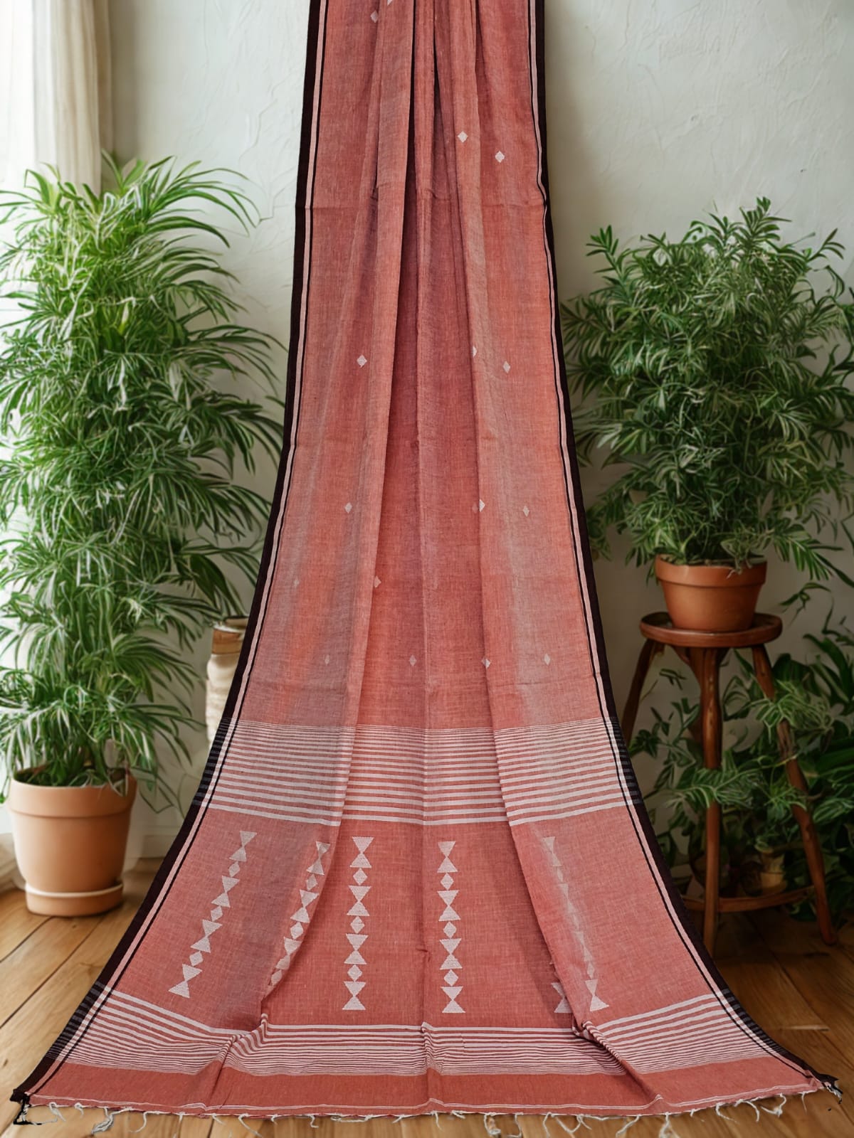 Krishnakeli – Peach Pink Jamdani Handloom Khadi Saree with White Motifs