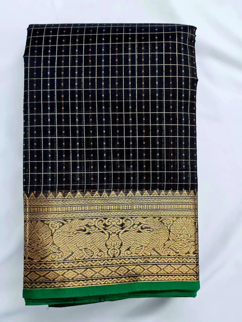 A folded Lakshadeepam Handloom Kanchi Silk Cotton Saree | Classic Black  