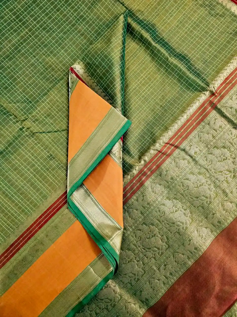 A close up of Lakshadeepam Handloom Kanchi Silk Cotton Saree | Forest Green with Mustard-Rust Pallu & Temple Zari Border