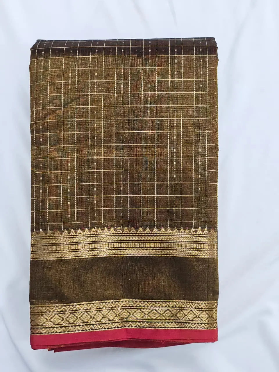 A folded Lakshadeepam Handloom Kanchi Silk Cotton Saree | Golden Brown with Yaali Motifs Pallu | Heritage Handloom