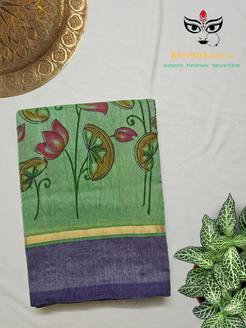 Nalini – Mint Green Handloom Bamboo Cotton Saree with Navy Blue Silk Cotton Pallu and Pichwai Print