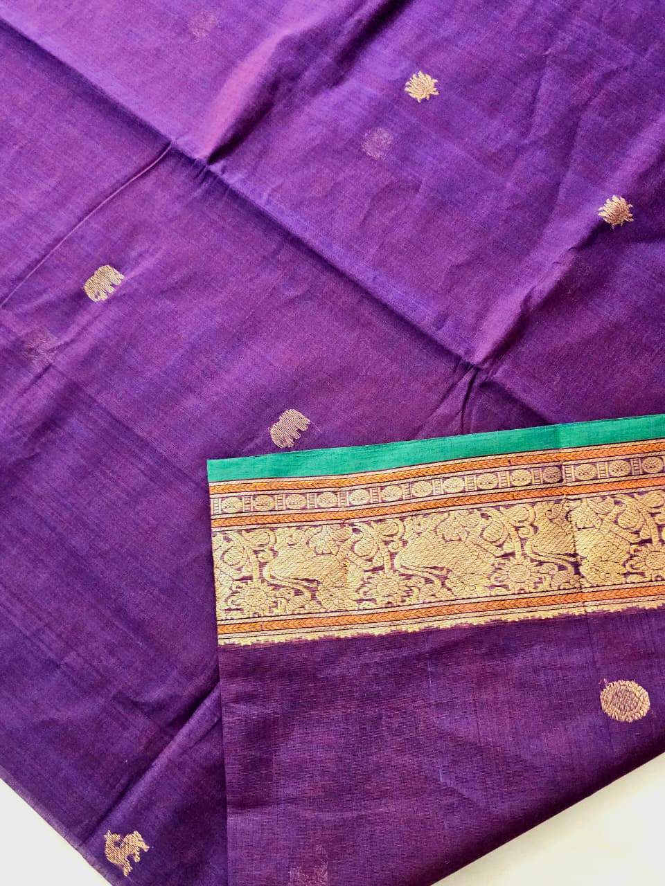 close up of motifs on Tejasvi – Purple Pure Handloom Kanchi Cotton Saree with Zari Border and Green Selvedge