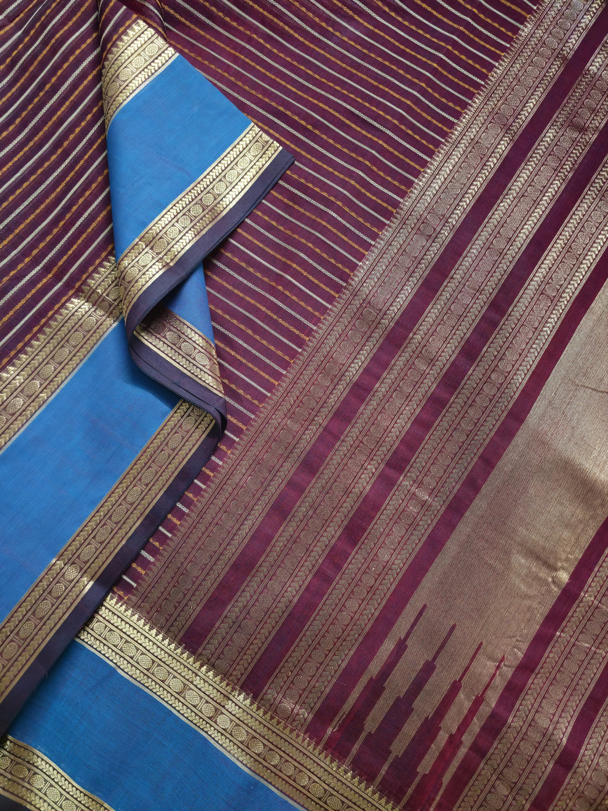 Vaigai Varninī – Maroon Handloom Kanchi Cotton Saree with Sky Blue Zari Border