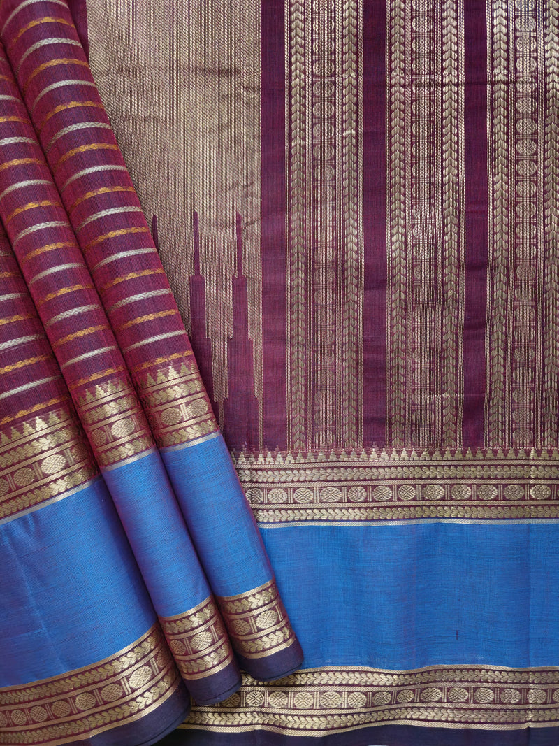 Vaigai Varninī – Maroon Handloom Kanchi Cotton Saree with Sky Blue Zari Border