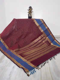 Vaigai Varninī – Maroon Handloom Kanchi Cotton Saree with Sky Blue Zari Border