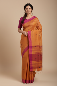 Yamika – Burnt Orange Handloom Khadi Saree with Magenta Pink Border & Bhujodi Motifs