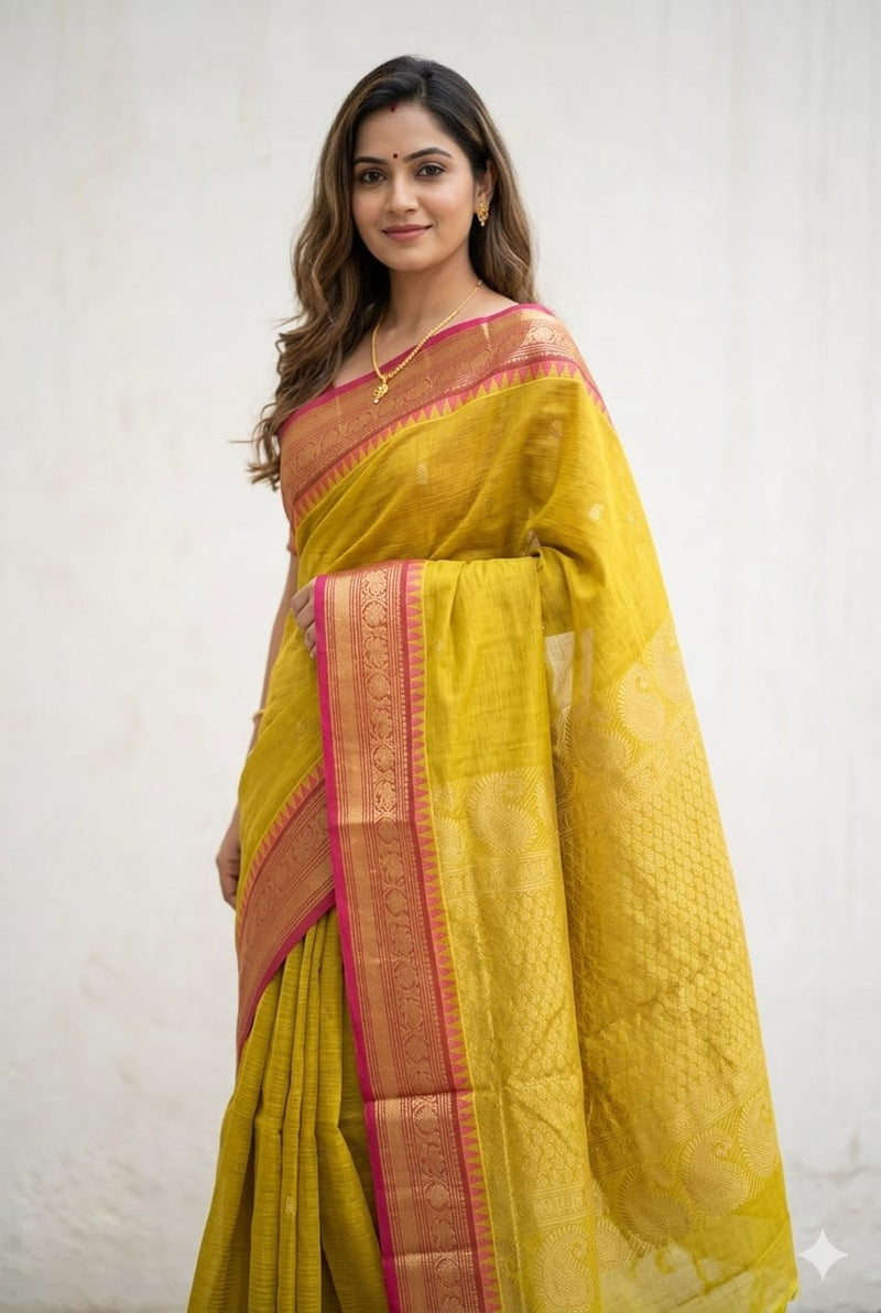 woman wearing a Yellow Handloom Venkatagiri Cotton Saree with Pink Zari Border