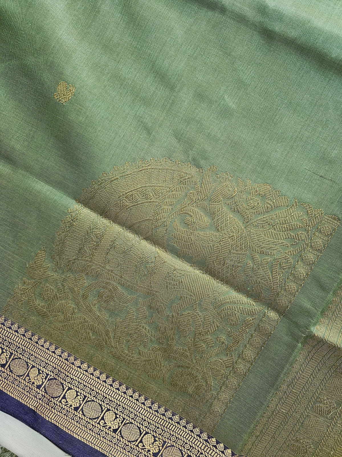 Harini – Pastel Green Handloom Kanchi Silk Cotton Saree with Blue Zari Border - Kleemkaara