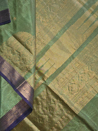 Harini – Pastel Green Handloom Kanchi Silk Cotton Saree with Blue Zari Border - Kleemkaara