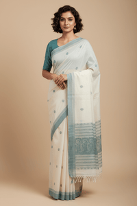 Pravya – Off-White Handloom Bengal Cotton Saree with Muted Teal Baluchari Motifs - Kleemkaara