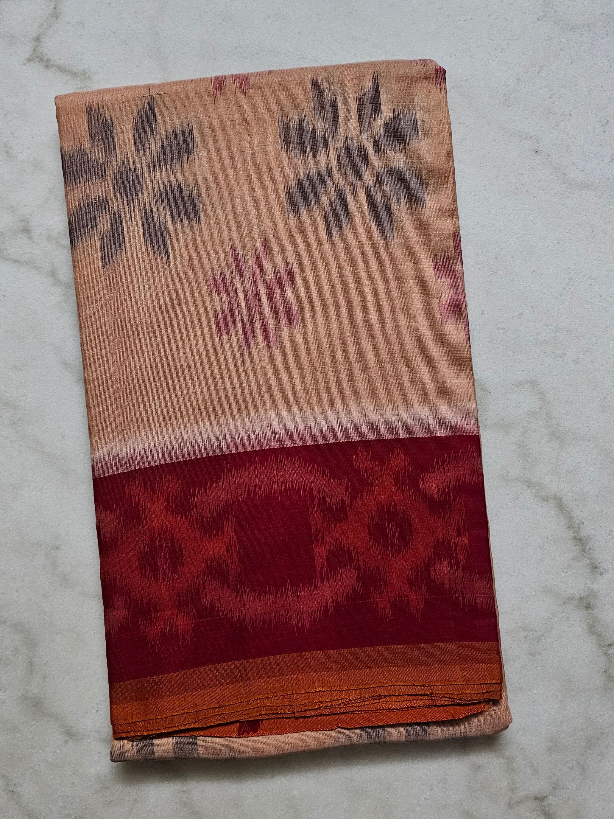 Salmon Pink Ikkat Cotton Saree with Red Border