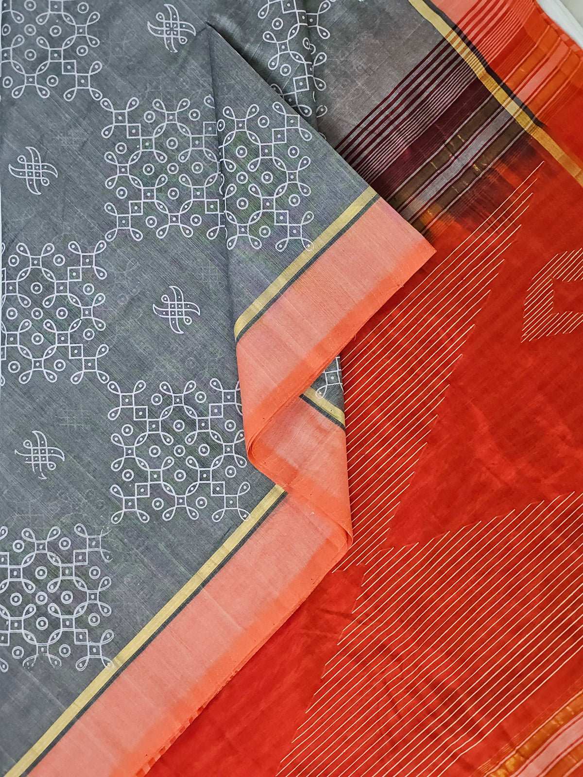 Swapnika – Grey and Orange Handloom Bamboo Cotton Saree with Orange Silk Cotton Pallu and Kolam Print - Kleemkaara